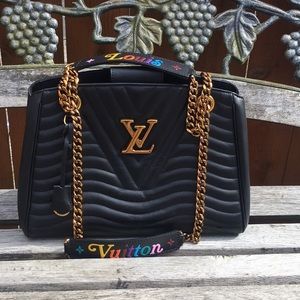 Authentic Louis Vuitton new wave bag.